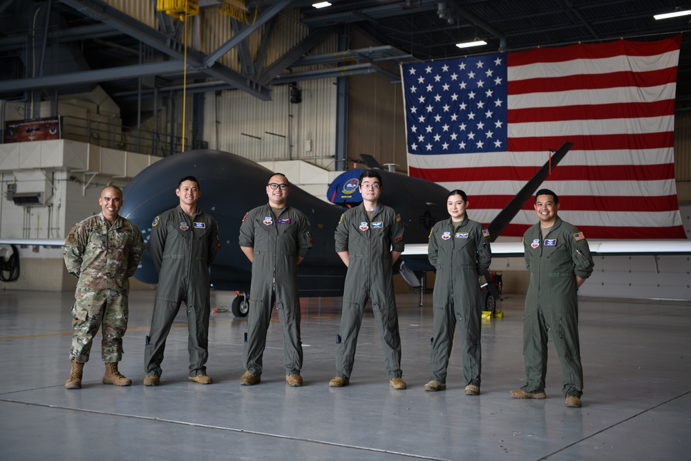 348th RS pilots celebrate shared heritage through historic Global Hawk sortie