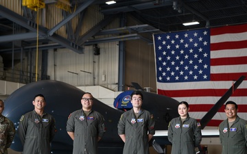 348th RS pilots celebrate shared heritage through historic Global Hawk sortie
