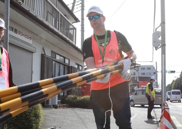 Camp Zama volunteers help with Tour of Japan bicycle race in Sagamihara