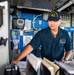 USS Robert Smalls (CG 62) Sailor Navigates Ship in the Pilot House