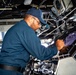 USS Robert Smalls (CG 62) Sailor Changes Helms Course in the Pilot House