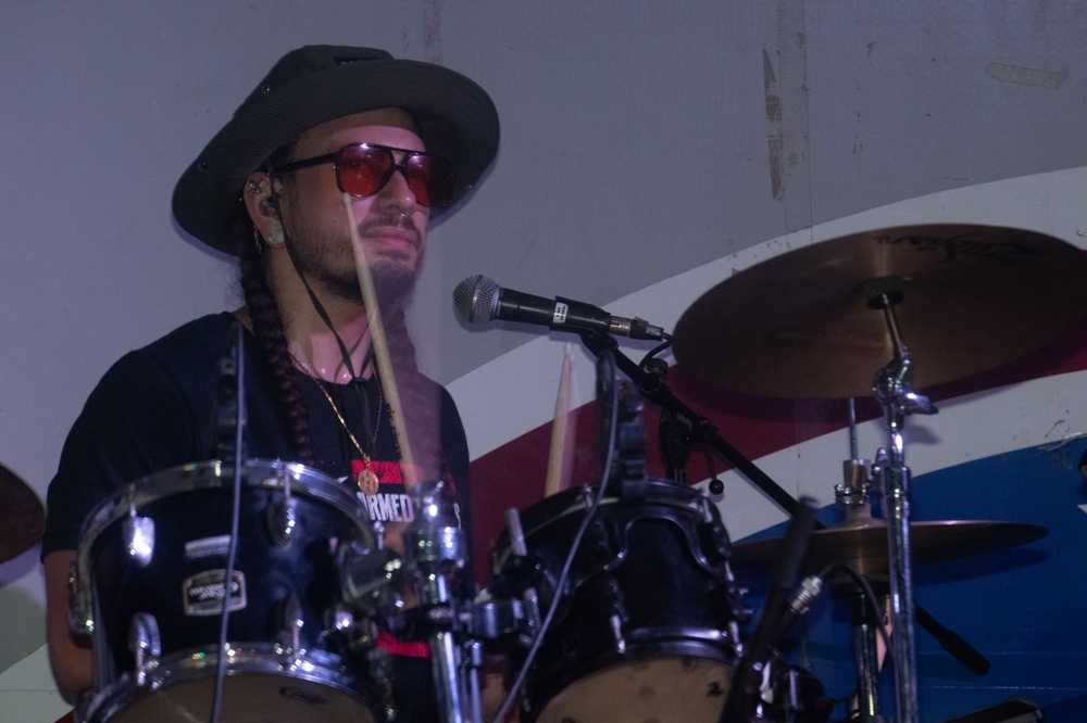 Kelandy Diaz performs at Camp Lemonnier