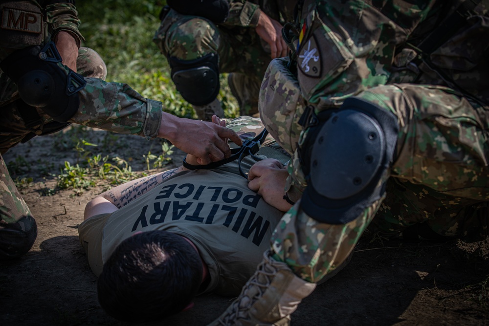 NATO partner military police forces train with U.S. military police.