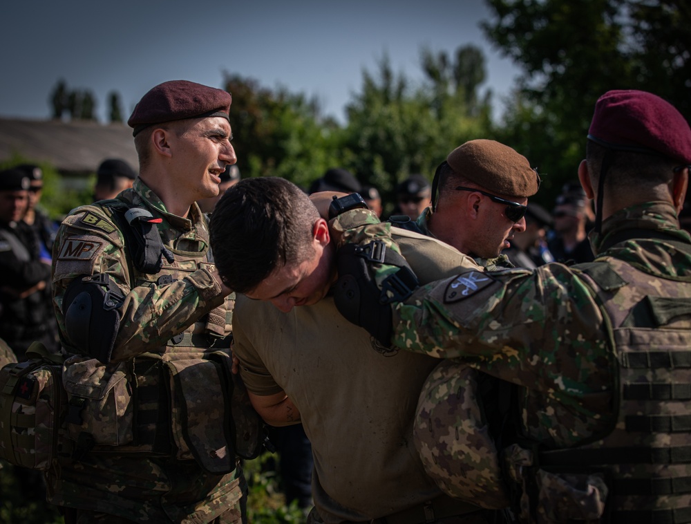 NATO military police trains by detaining and searching U.S. military police forces