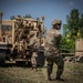 U.S. troops demonstrate vehicle towing procedures to NATO forces