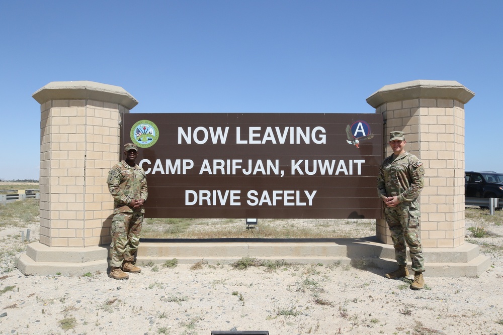 ASG-KU Command Team at Camp Arifjan Sign, March 2023
