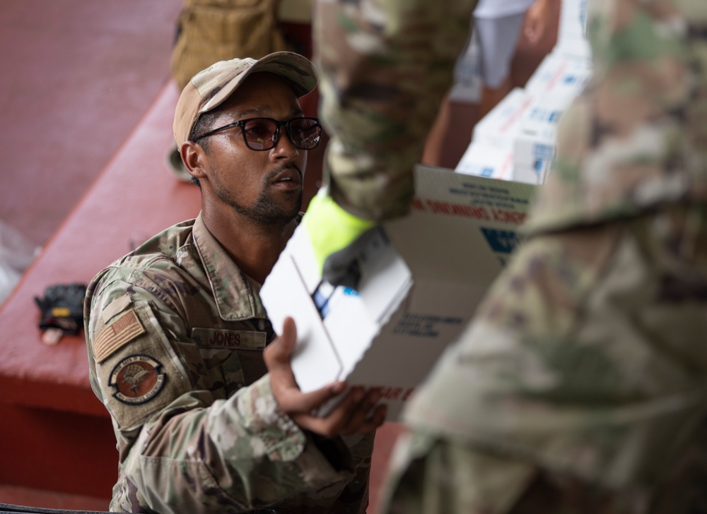 Team Andersen and FEMA distribute typhoon relief supplies to the villages in Guam