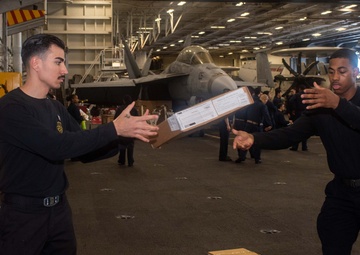 USS Ronald Reagan (CVN 76) Sailors conduct a replenishment-at-sea