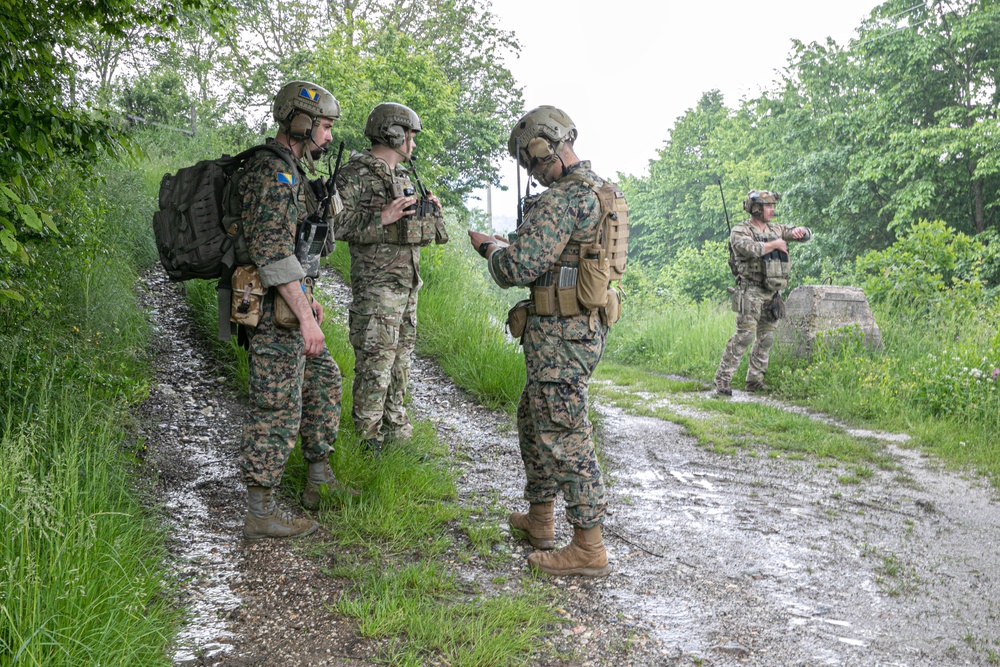 Members of the Armed Forces of Bosnia and Herzegovina’s Joint Terminal Attack Controller (JTAC) team train with US Special Operations Forces to coordinate a training bomber support mission near Tuzla, Bosnia and Herzegovina, 30 MAY 2023.