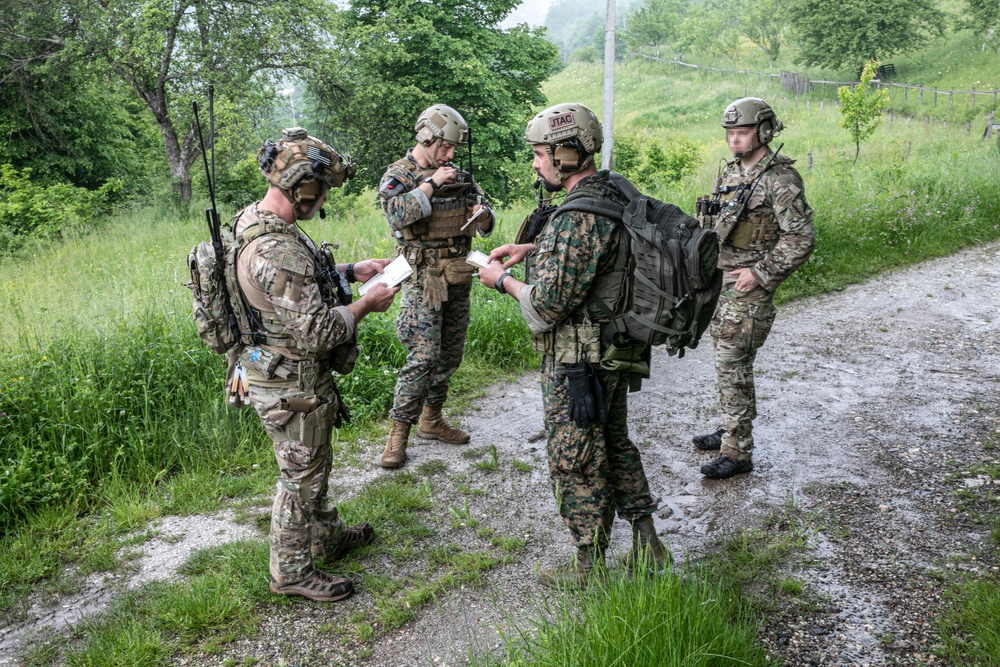 Members of the Armed Forces of Bosnia and Herzegovina’s Joint Terminal Attack Controller (JTAC) team train with US Special Operations Forces to coordinate a training bomber support mission near Tuzla, Bosnia and Herzegovina, 30 MAY 2023.