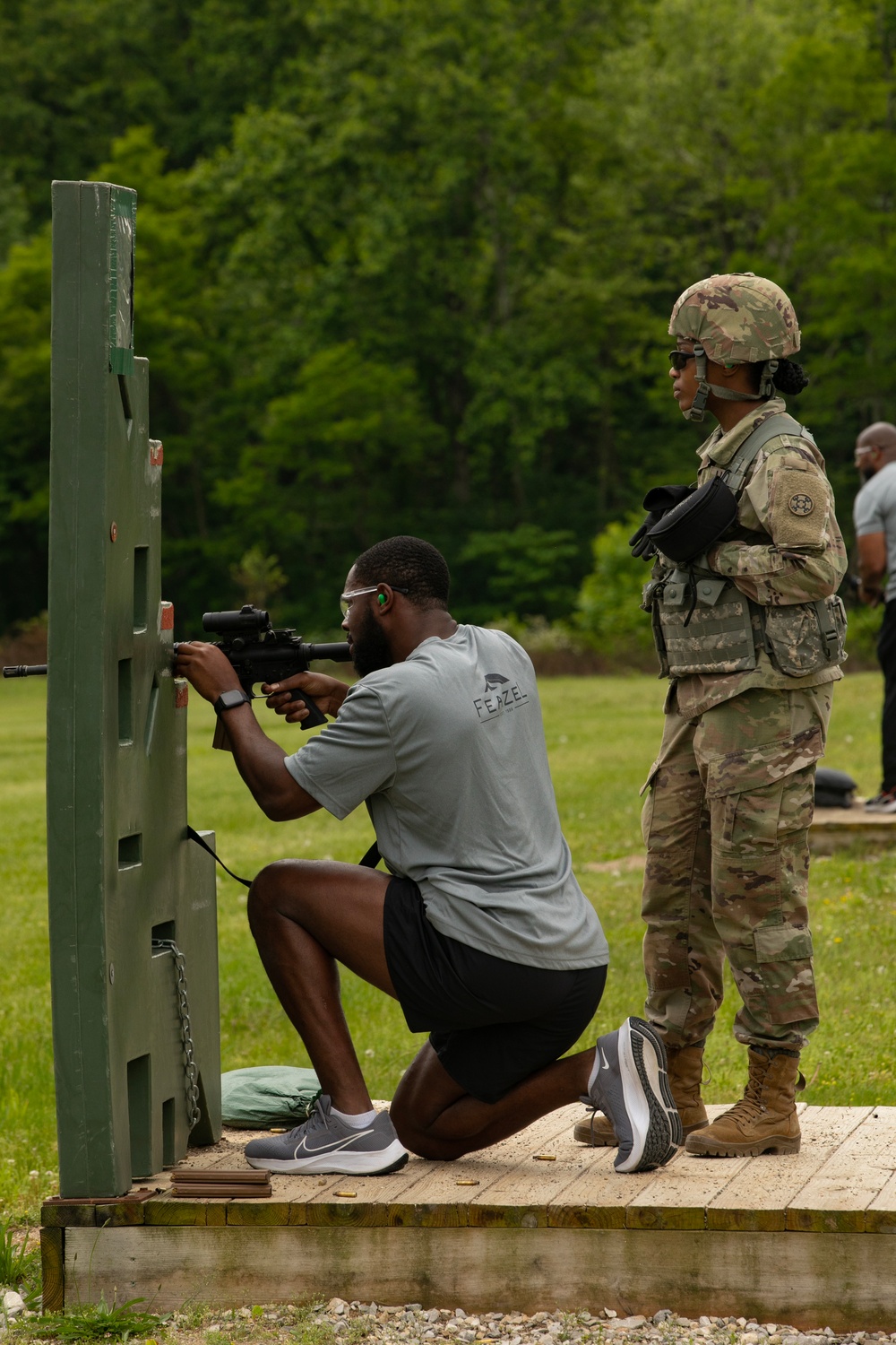 Cincinnati Bengals Shoots M4 Rifles with the 373rd Quartermaster Battalion