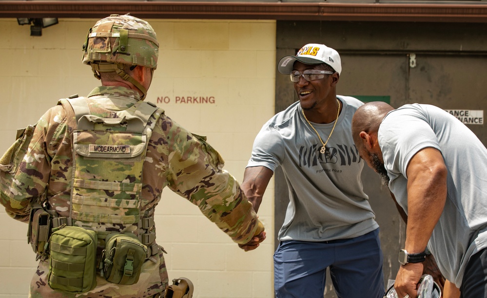 Cincinnati Bengals Shoots M4 Rifles with the 373rd Quartermaster Battalion