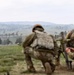 Iowa infantrymen prepare to fire 60 mm mortar