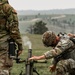 Iowa infantryman prepares to fire 60 mm mortar