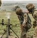 Iowa infantrymen fire 60 mm mortar