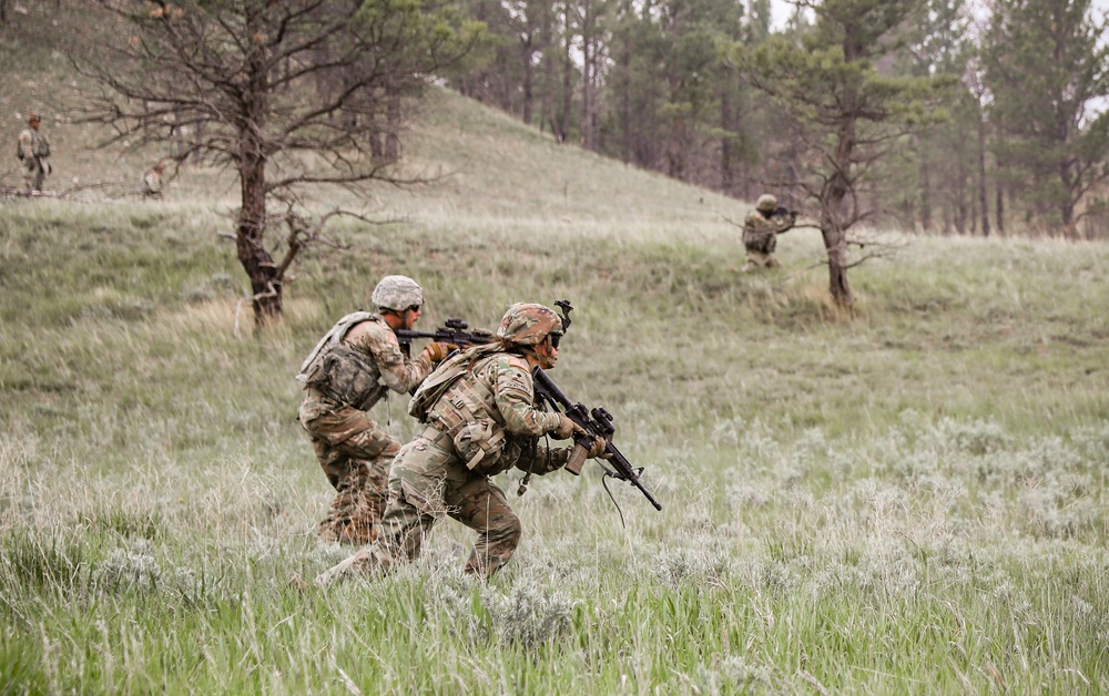 Iowa infantrywoman conducts squad live-fire exercise at Camp Guernsey