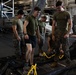 Marines assemble rafts on USS Bataan