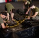 Marines assemble rafts on USS Bataan