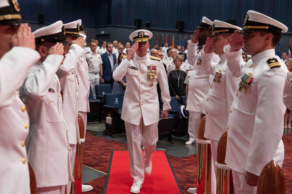 Vice Adm. Karl Thomas, commander, U.S. 7th Fleet salutes side boys during the Commander, Submarine Group 7 change of command ceremony.