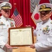Vice Adm. Tawara Tateki, commander, Fleet Submarine Force, JMSDF presents a letter of commendation to Rear Adm. Rick Seif.