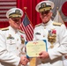 Vice Adm. Karl Thomas, commander, U.S. 7th Fleet presents the Legion of Merit to Rear Adm. Rick Seif.