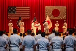 Vice Adm. Tawara Tateki, commander, Fleet Submarine Force, JMSDF , right, presents a 1st Grade Defense Cooperation Medal to Rear Adm. Rick Seif