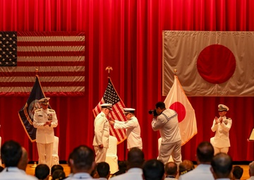 Vice Adm. Tawara Tateki, commander, Fleet Submarine Force, JMSDF , right, presents a 1st Grade Defense Cooperation Medal to Rear Adm. Rick Seif