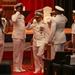 Rear Adm. Chris Cavanaugh salutes side boys during the Commander, Submarine Group 7 change of command ceremony