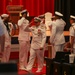 Rear Adm. Rick Seif salutes side boys during the Commander, Submarine Group 7 change of command ceremony.