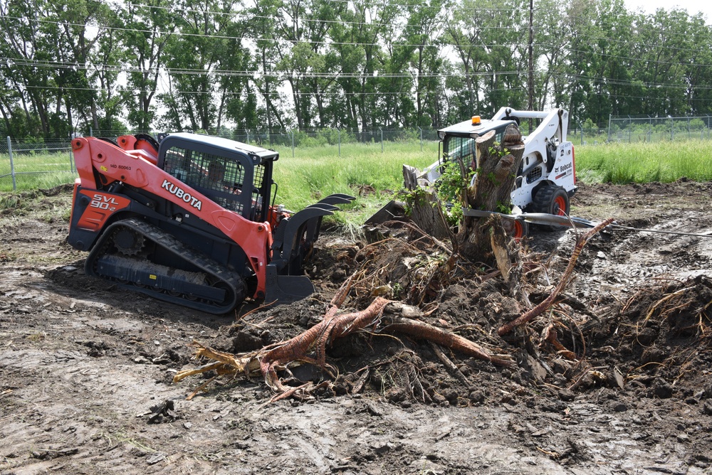 Skid-steer stump removal