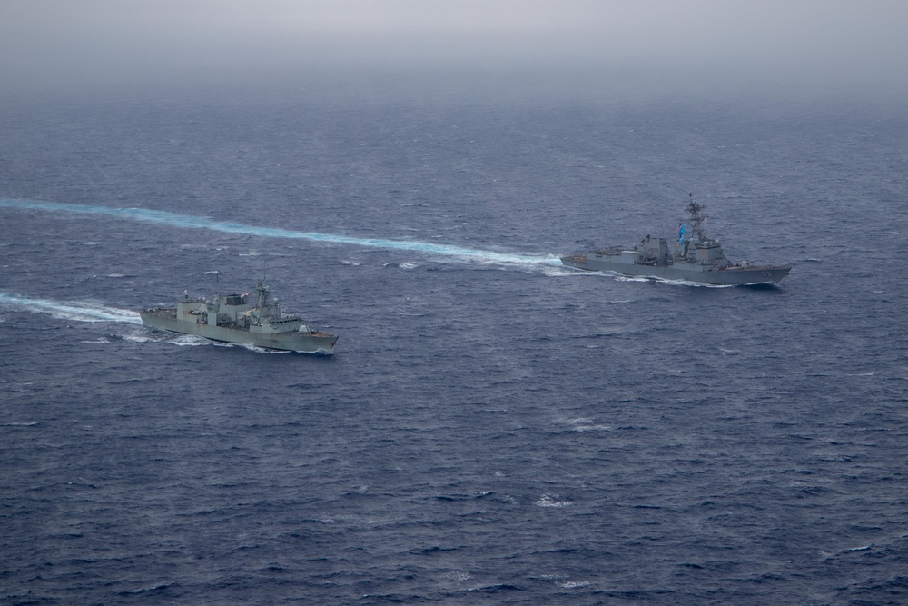 USS Chung-Hoon sails alongside HMCS Montreal