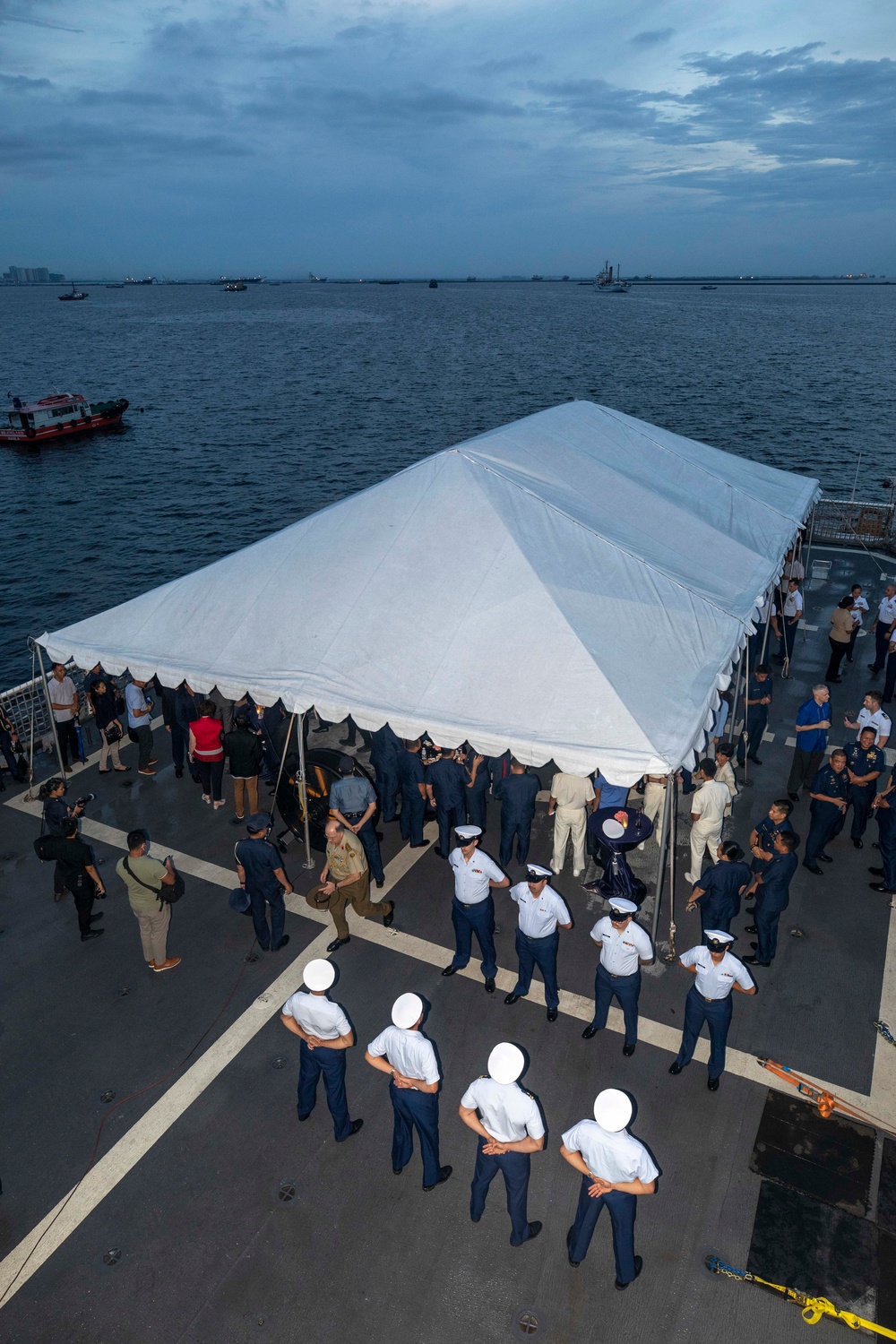 U.S. Coast Guard Cutter Stratton hosts shipboard dinner to commemorate trilateral engagement