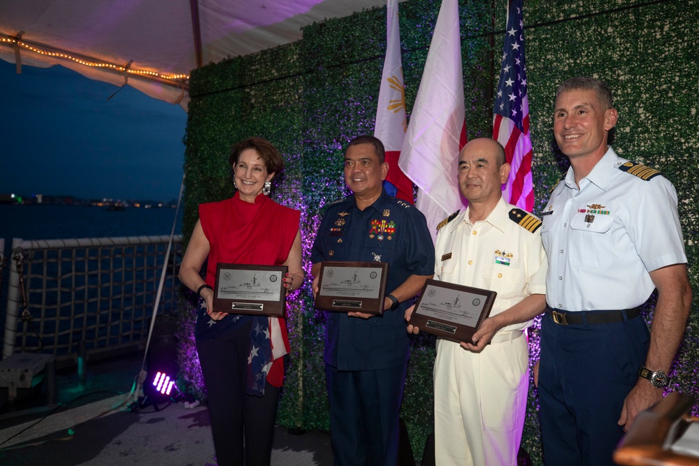 U.S. Coast Guard Cutter Stratton hosts shipboard dinner to commemorate trilateral engagement