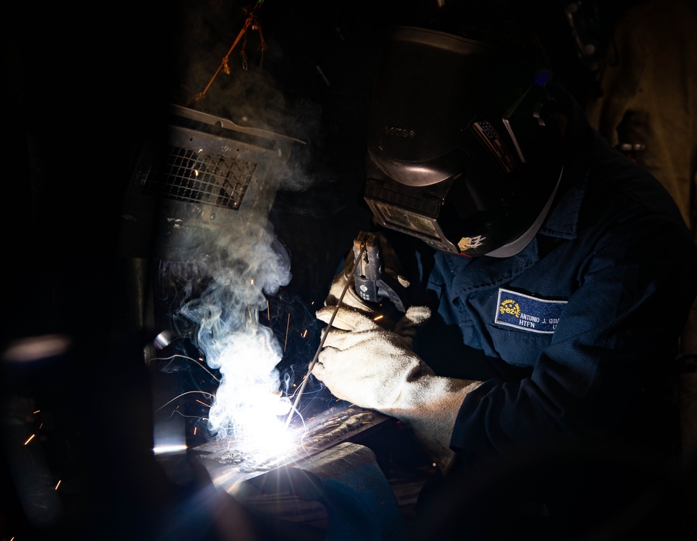 USS Robert Smalls (CG 62) Fireman Utilizes Flat Stick Welding