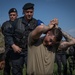 Soldiers from the 508th Military Police Company demonstrate detaining procedures to Albanian and Bulgarian servicemen during DEFENDER 23