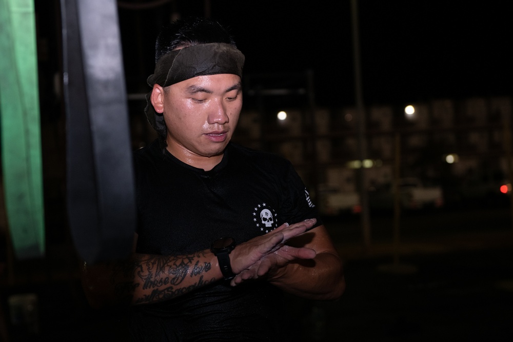 Service members deployed to Camp Lemonnier, Djibouti, perform “The Murph Challenge”