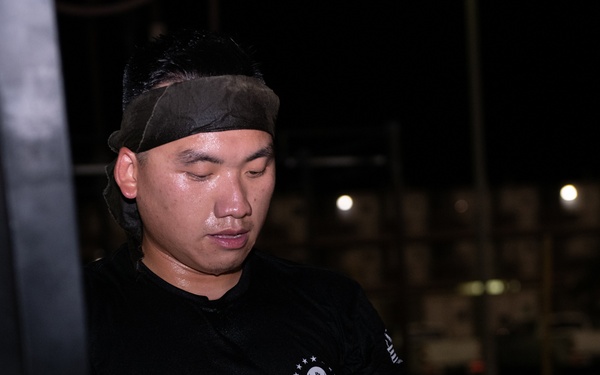 Service members deployed to Camp Lemonnier, Djibouti, perform “The Murph Challenge”