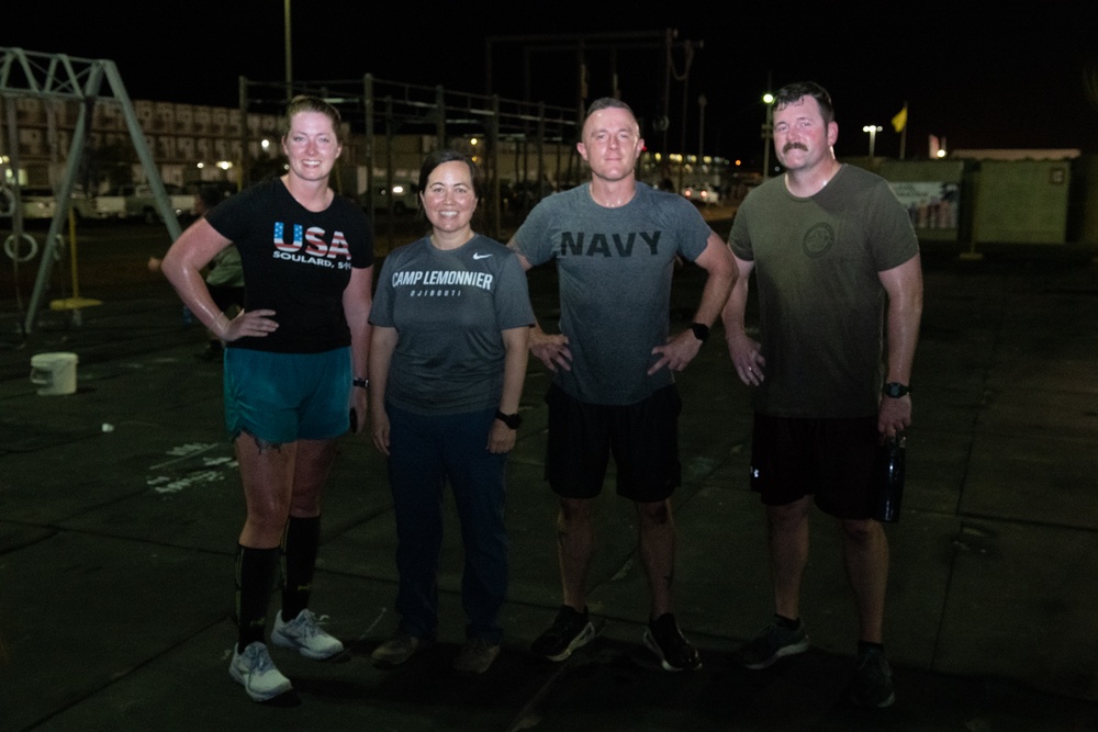 Service members deployed to Camp Lemonnier, Djibouti, perform “The Murph Challenge”