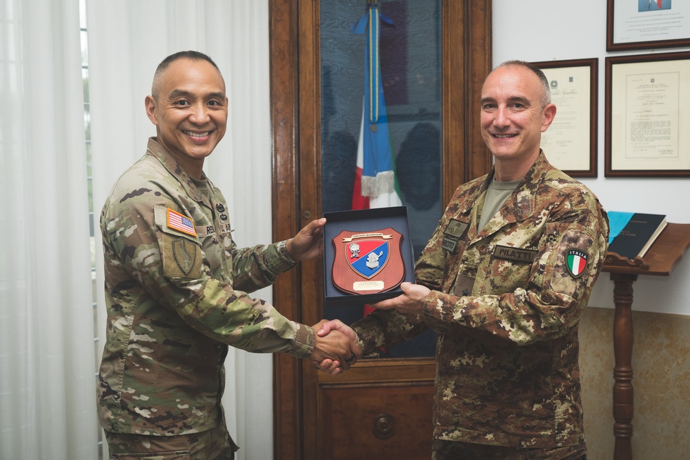 Brig. Gen. Davide Pilatti exchanging gifts with Brig. Gen. Royce Resoso
