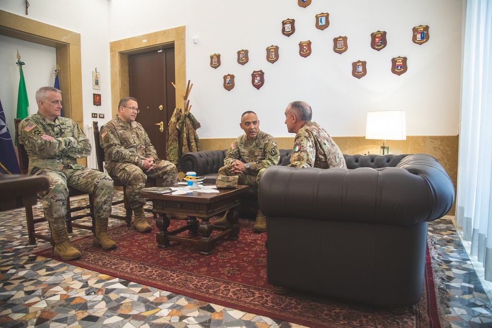 Brig. Gen. Royce Resoso, Col. Brian Wisniewski, and Lt. Col. Jason Scott meeting with Brig. Gen. Davide Pilatti
