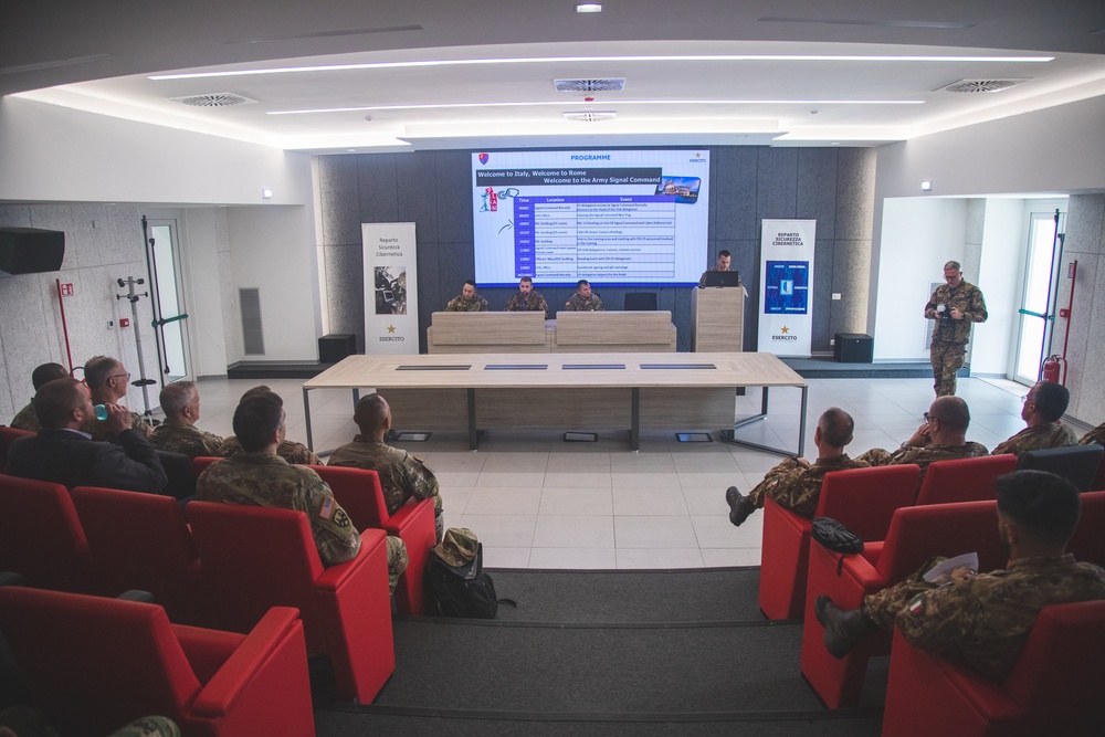 The Army Reserve Cyber Protection Brigade and the Reparto Sicurezza Cibernetica observing a presentation on the Cyber SME Tech Exchange Event