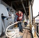 USS Harpers Ferry (LSD 49) sailor makes preparations to get underway