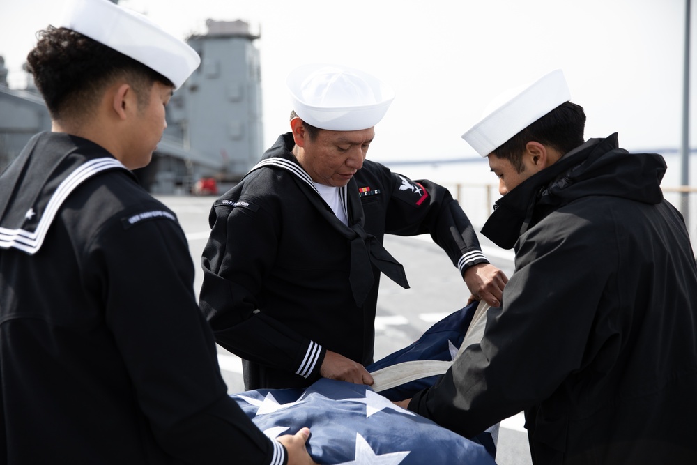 dvids-images-uss-harpers-ferry-lsd-49-sailors-fold-the-ensign-as