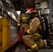 USS Harpers Ferry (LSD 49) sailors participate in a main space fire drill