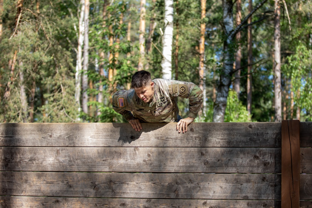 Victory Corps’ Elhers Cup participants tackle an obstacle course on their third day