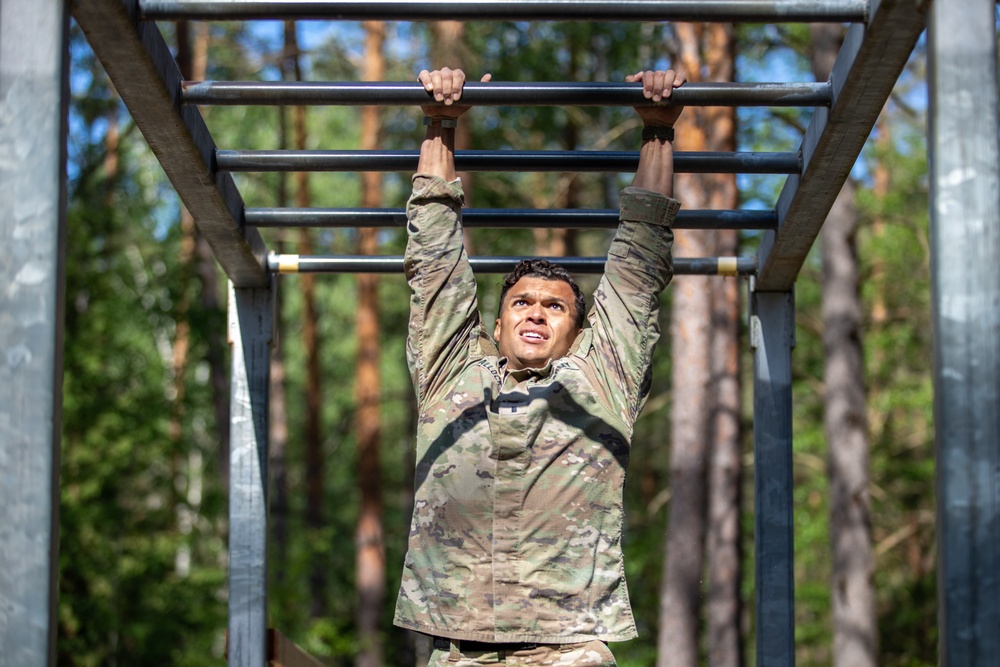 Victory Corps’ Elhers Cup participants tackle an obstacle course on their third day