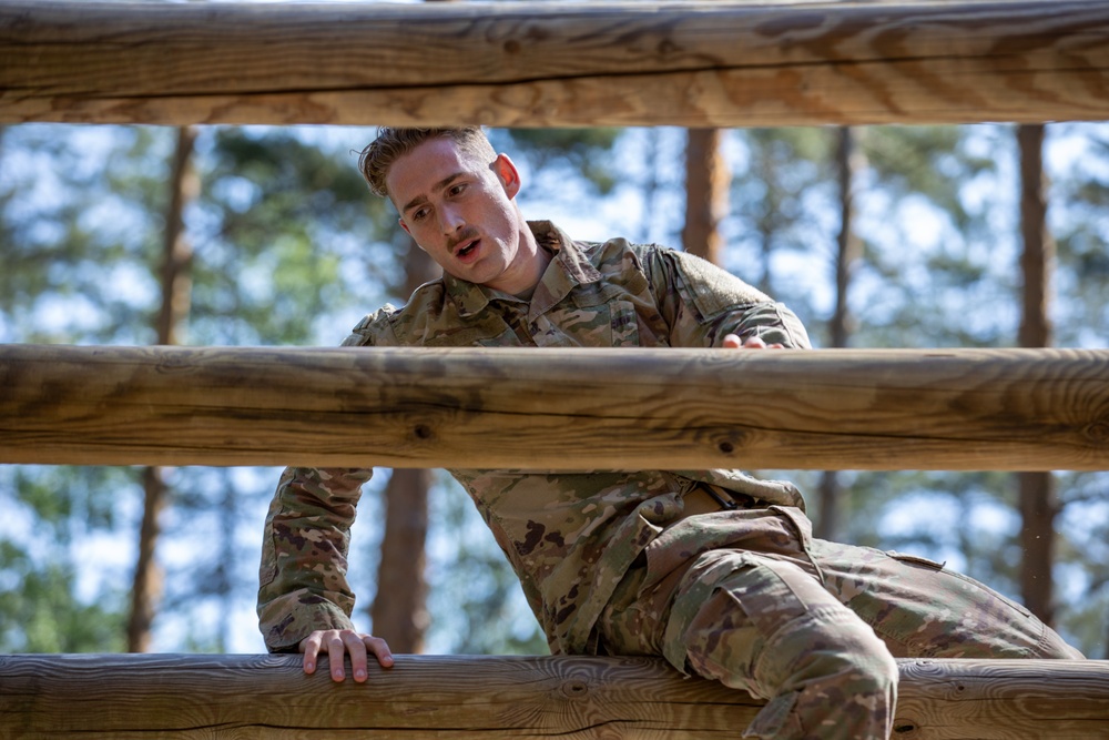 Victory Corps’ Elhers Cup participants tackle an obstacle course on their third day