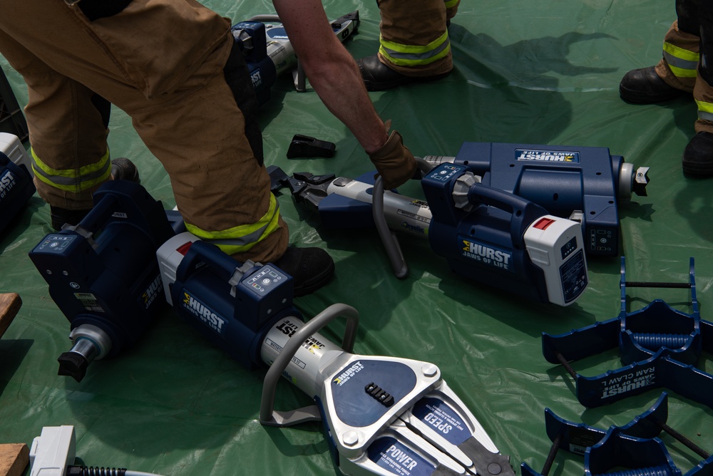 110th Wing firefighters use hydraulic rescue tools