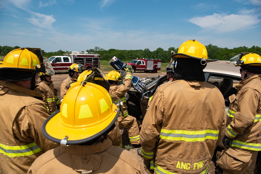 110th Wing firefighters practice using rescue tools