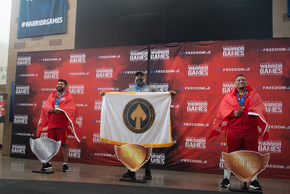 USSOCOM competes in the powerlifting competition during DoD’s 2023 Warrior Games Challenge